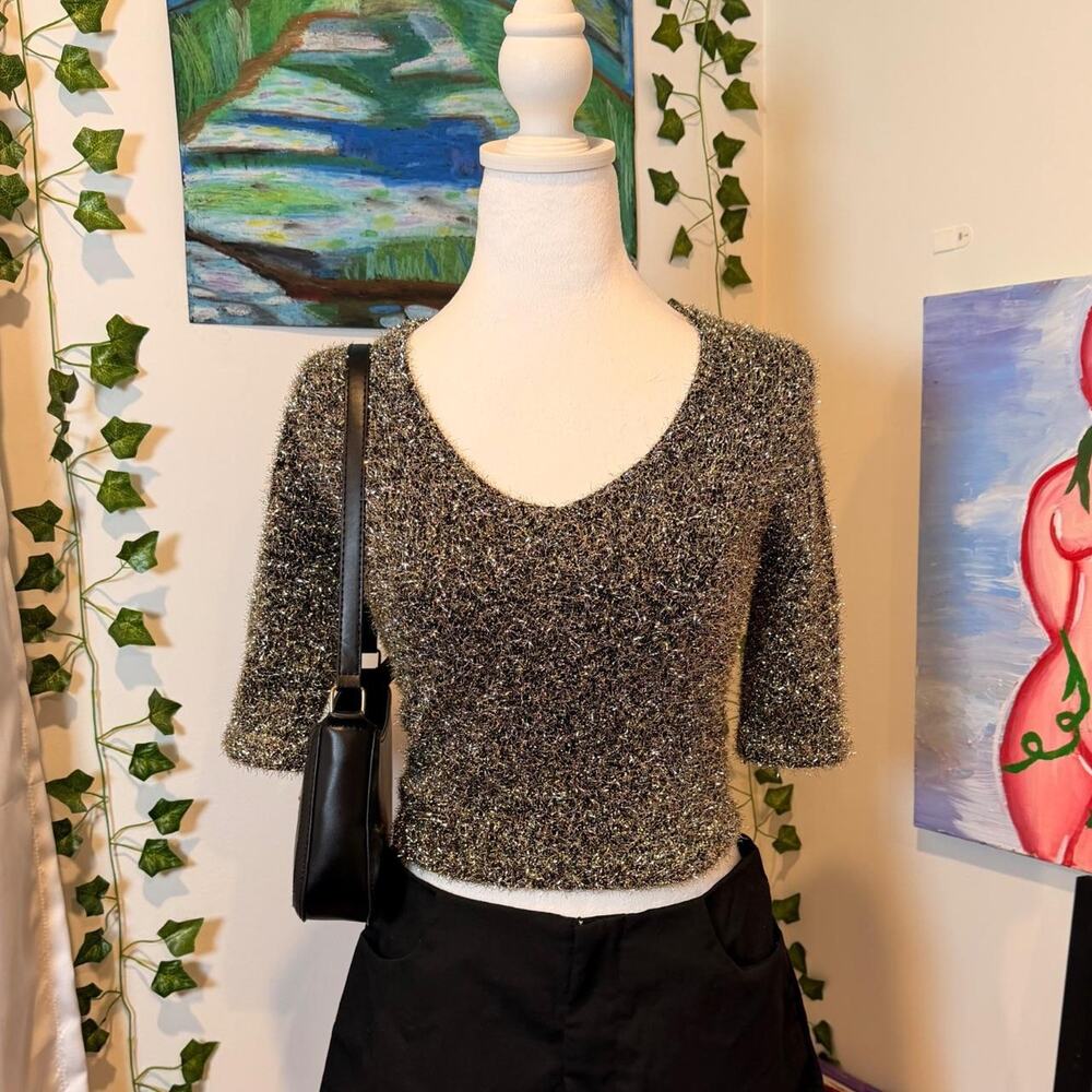 Metallic fuzzy scop neck